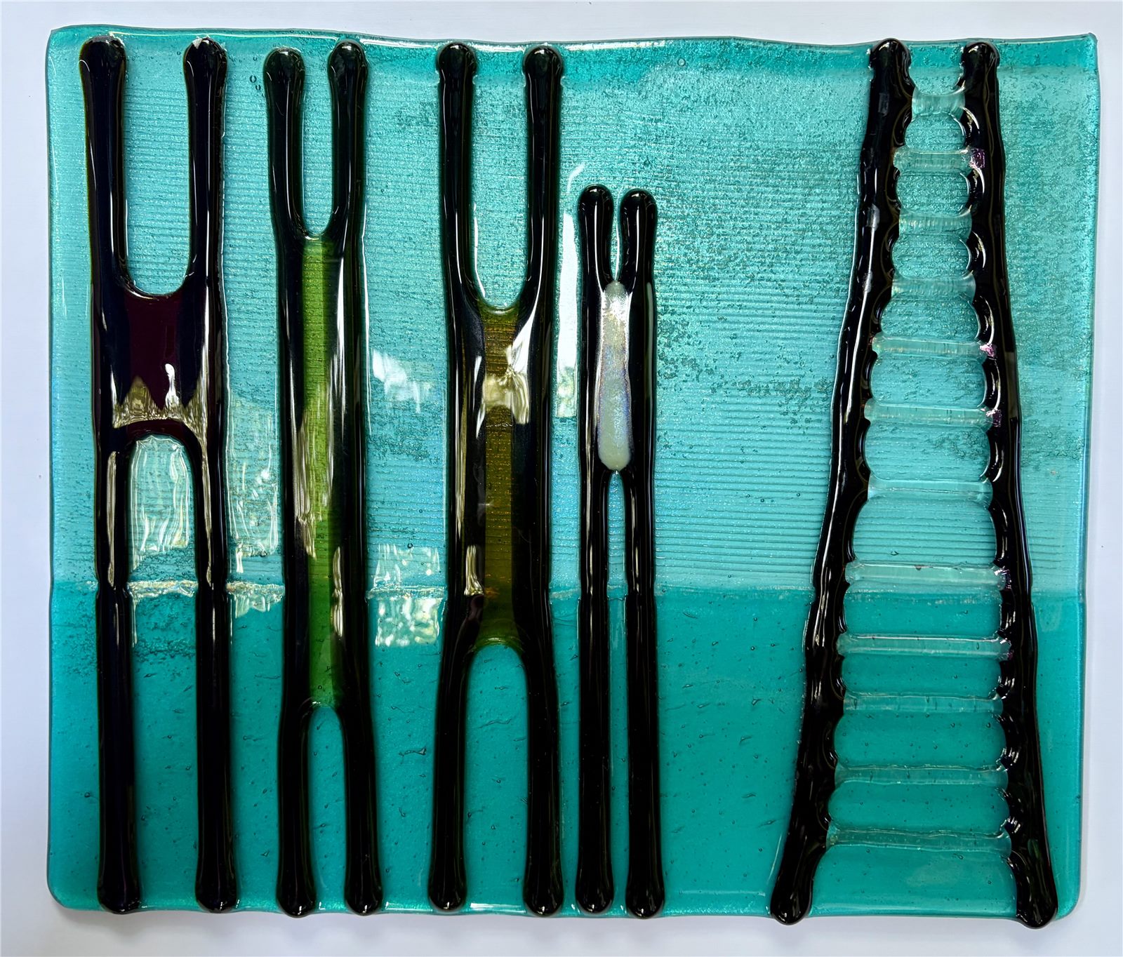 Treading Water — fused glass by Patti Wessman